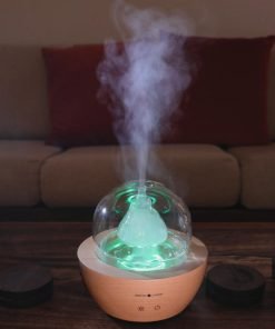 Serene Living Fountain Diffuser turned on with green light