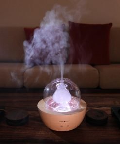 Serene Living Diffuser turned on with pink light