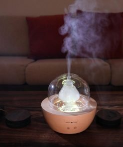 Serene Living Diffuser turned on with yellow light