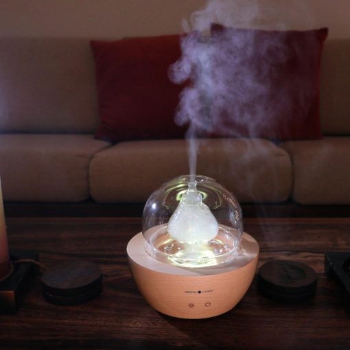 Serene Living Diffuser turned on with yellow light