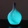 Spamister marble diffuser by Greenair with aqua colored light