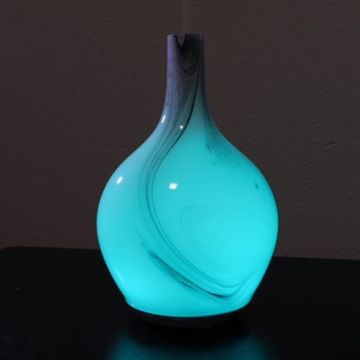 Spamister marble diffuser by Greenair with aqua colored light