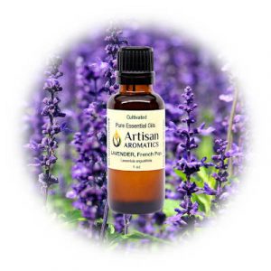 Lavender essential oil by Artisan Aromatics on a lavender background