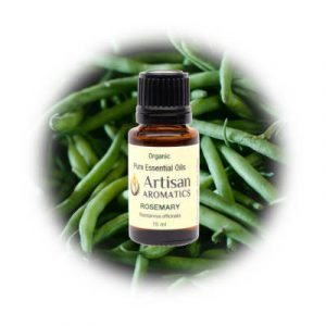 Rosemary essential oil by Artisan Aromatics on a rosemary background