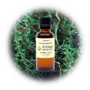 Thyme essential oil by Artisan Aromatics on a background of thyme