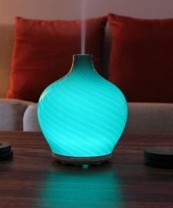 Leah diffuser by GreenAir with cyan light and steam
