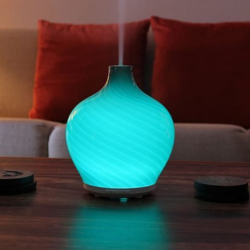 Leah diffuser by GreenAir with cyan light and steam