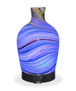 Aromar Glass Abstract Decanter Diffuser with blue light on a white background