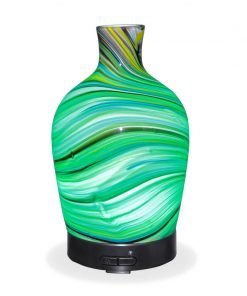 Aromar Glass Abstract Decanter Diffuser with green light on a white background