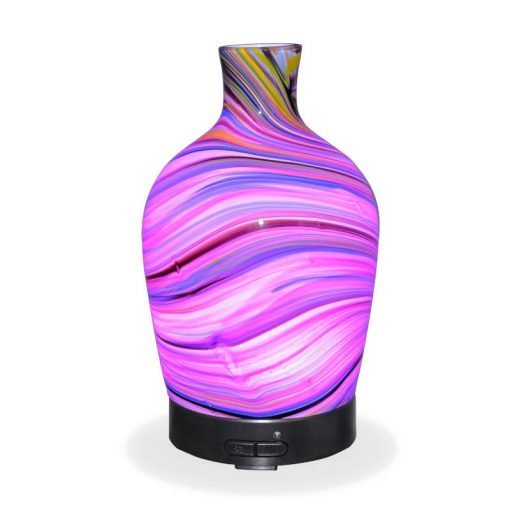 Aromar Glass Abstract Decanter Diffuser with purple light on a white background