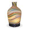 Aromar Glass Abstract Decanter Diffuser with yellow light on a white background