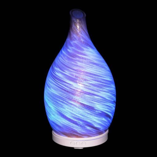 Amphora Copper Diffuser with blue light on a black background