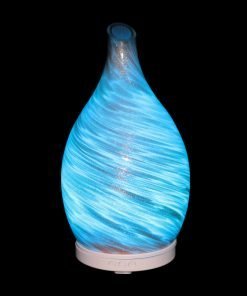 Amphora Copper Diffuser with cyan light on a black background