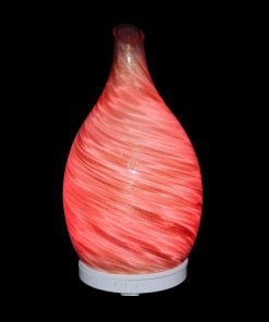 Amphora Copper Diffuser with red light on a black background