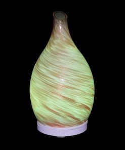 Amphora Copper Diffuser with yellow light on a black background