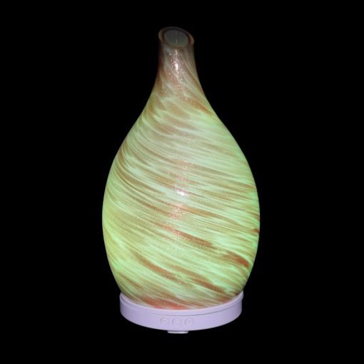 Amphora Copper Diffuser with yellow light on a black background