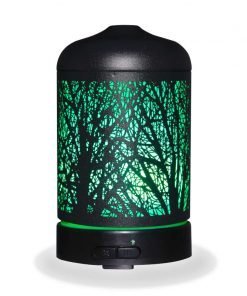 Aromar Black Grove Diffuser with green light on a white background