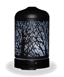 Aromar Black Grove Diffuser with white light on a white background