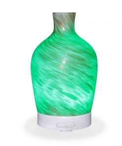 Aromar Decanter Abstract Bronze Diffuser with green light on a white background