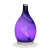 Aromar rotating Amphora blue diffuser with purple light on white background
