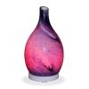 Aromar Rotating Amphora Blue diffuser with red light on a white background