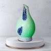 Aromar Hydria Abstract Diffuser on white display sound with green light on