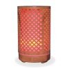 Aromar Tranquil Wood Diffuser with red light on a white background