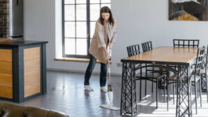 Woman mopping a floor